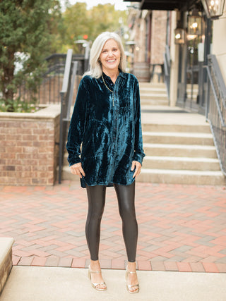 wear this peacock blue velvet button down in an oversized fit for holiday parties with faux leather leggings