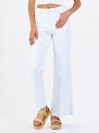bright white mid rise wide leg jeans with cut off hem and soft flair