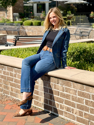 a flattering blue denim jean blazer jacket worn with blue denim jeans