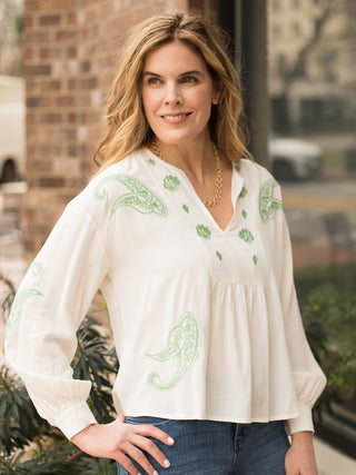 long sleeve loose fit cream v neck blouse with green embroidery design