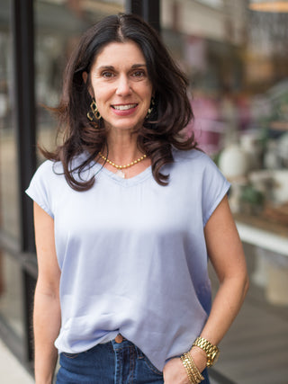 a short sleeve periwinkle silk top in a relaxed fit