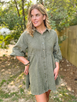 a light olive green button down mini dress in denim perfect for casual fall fashion