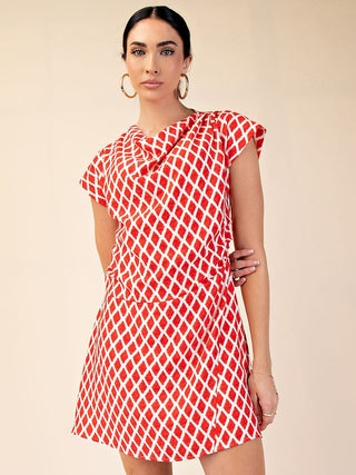 a soft and flattering mini dress with a vibrant red and white diamond pattern