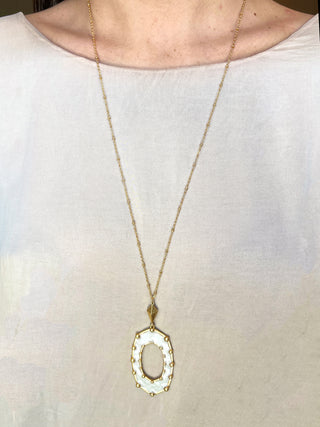 long stylish gold chain necklace with gold and white oval pendant