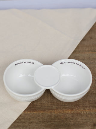 a white double dish for dip that reads sneak a snack and hard snack to follow perfect for holiday parties and host gifts