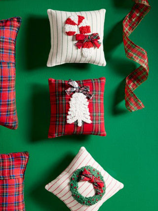 mini holiday pillows with embroidered christmas images 