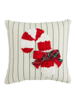 a mini holiday decorative pillow with an embroidered candy cane image