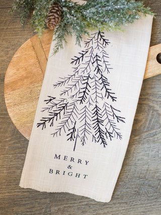 place this durable white tea towel with a black sketched christmas tree in your kitchen for holiday home decor