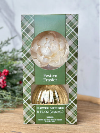 a festive holiday flower diffuser with scents of fir needles and cedar wood 