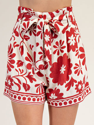 vibrant ivory and red floral high waisted shorts with a belt tie at front