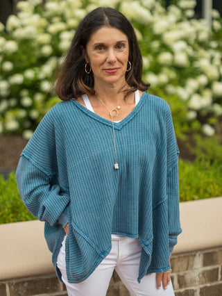 an oversize teal waffle knit top with long sleeves and a v neck perfect for your loungewear collection