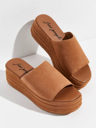 retro style sandals in a tan color and mule design with a wide leather vamp