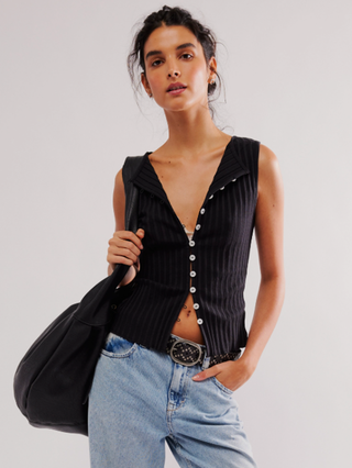black ribbed vest with white buttons 