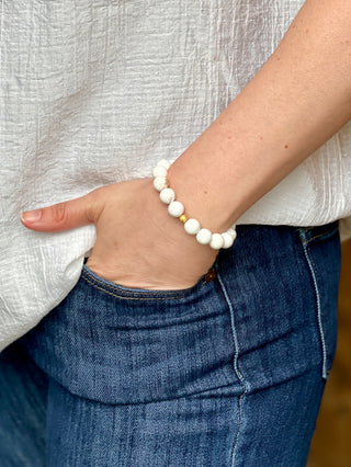 handcrafted howlite gemstone beaded elastic bracelet with gold plate accent