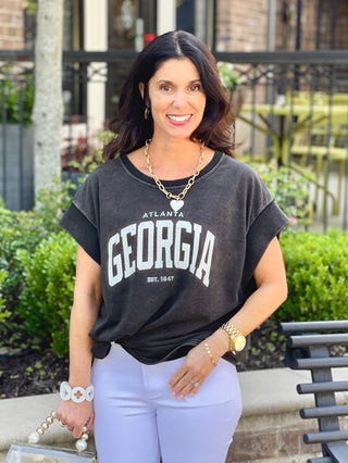 soft relaxed fit vintage tee in washed black that reads atlanta georgia