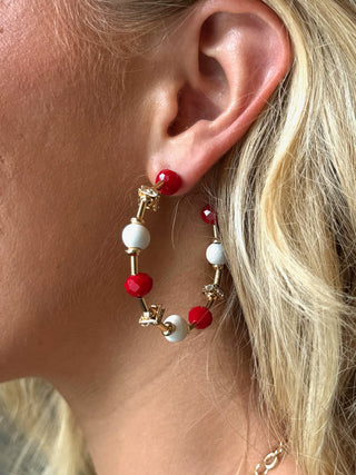 red and white beaded gold hoop earring