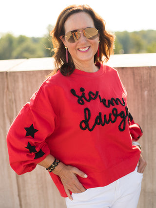 a red sweater with black details perfect for uga bulldogs football fans and fall game day fashion