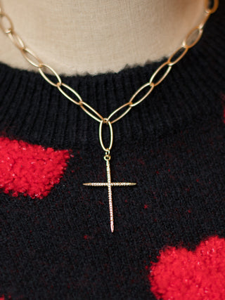 a gold statement rhinestone cross necklace 