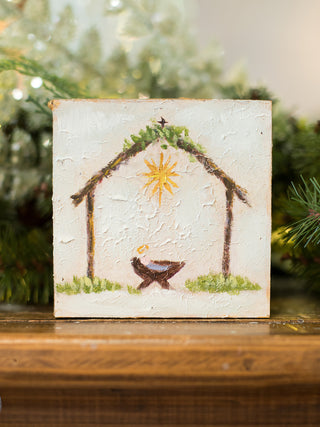 decorate with this handpainted piece depicting the manger in your home as christmas decor or give as a hostess gift