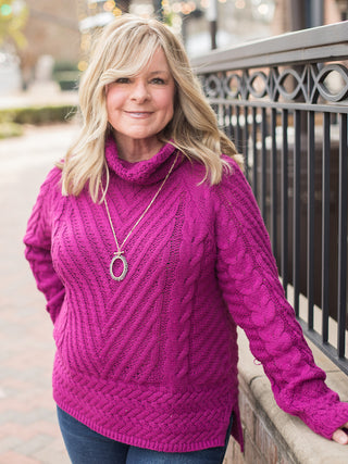 wear this hot pink cable knit sweater with a turtleneck to valentines day events and cozy girls night in