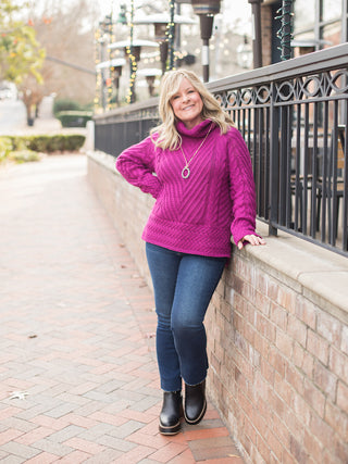 wear this hot pink cable knit sweater with a turtleneck to valentines day events and cozy girls night in with black boots