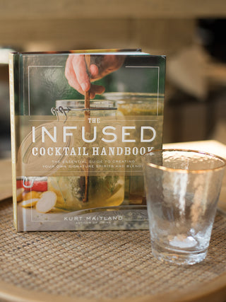 a cocktail recipe book that demonstrates how to infused various liquors perfect for home bar carts and host gifts