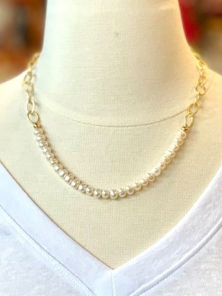 charming pearl beaded necklace with gold accents and a gold oval link chain