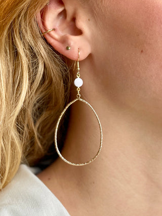 lightweight gold teardrop hoop earrings with a pearl accent