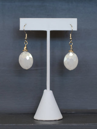 wear these crystal drop statement earrings in smoky white with gold hardware as statement jewelry or give as a gift