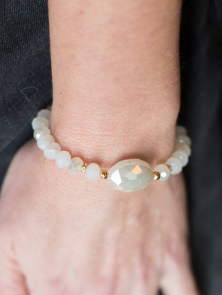wear this stretch bracelet with pearlescent crystals for sophisticated events and pair with its matching necklace