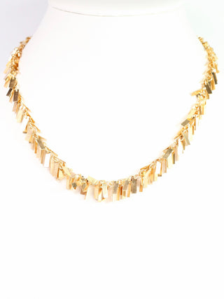 a shimmering gold fringe necklace