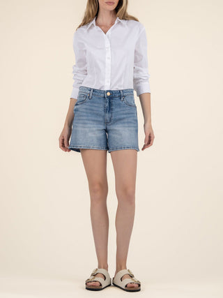 classic high rise denim jean shorts with a flattering fit worn with a white shirt