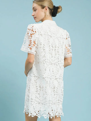 a bright white floral laced v neck collared mini dress