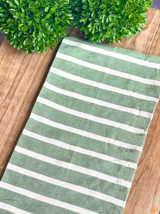 white and green cotton lake house tea towel