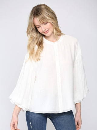 white button up top with balloon sleeves and round neckline