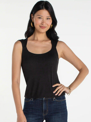 a sleek black tank top with a built in bra and cinched shoulders