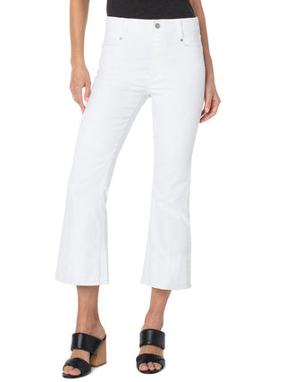white crop flare denim pants with cut hem and stretchy fit