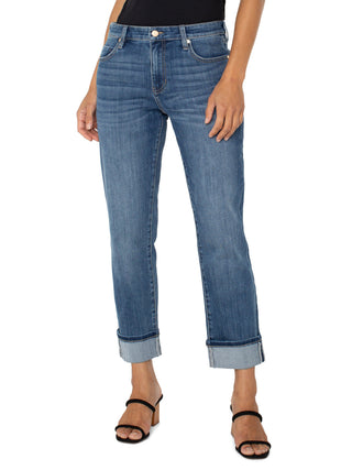 a pair of light rio hondo mid rise denim jeans with cuffed hems