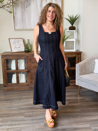 a flattering dark wash indigo denim smocked midi dress