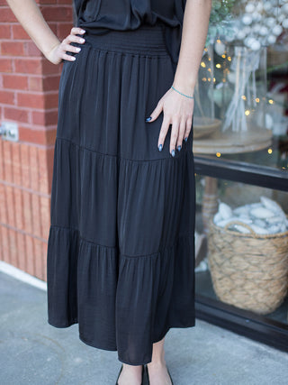 wear this peasant style skirt in black with pockets and a comfort waist for a feminine and frilly addition to your closet