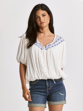 relaxed white self tie v neck blouse with blue embroidery detail