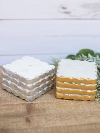 a collection of gold and silver coasters perfect for christmas holiday home decor and as stocking stuffer gifts