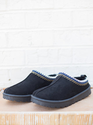 wear these black slip on clogs in faux suede with christmas morning pajamas and cozy winter beach days 