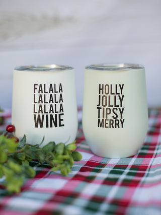 a pair of white and black stemless christmas wine tumblers perfect for holiday home decor and stocking stuffer gifts