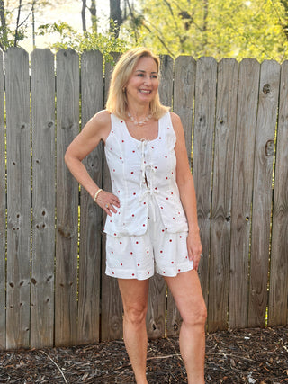 white shorts with red polka dots and a matching tank