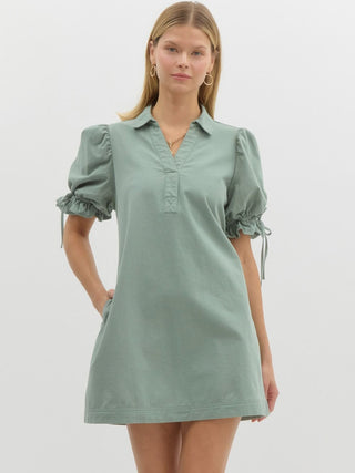green mini dress with cinched bubble sleeves v neck and cinched back