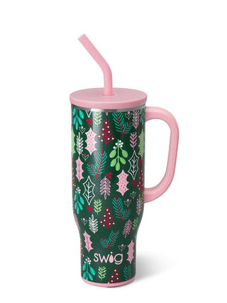 a large yeti style mug with a pink and green mistletoe holiday design