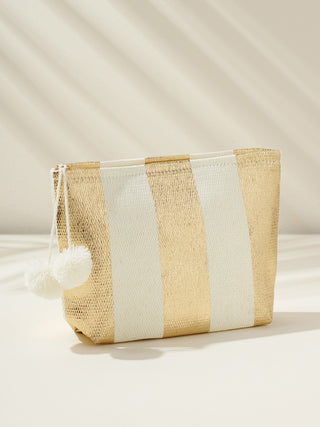 gold and white metallic zip pouch with white pom poms