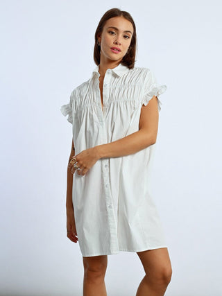 a chic white mini shirt dress with ruffled sleeves and blouse collar