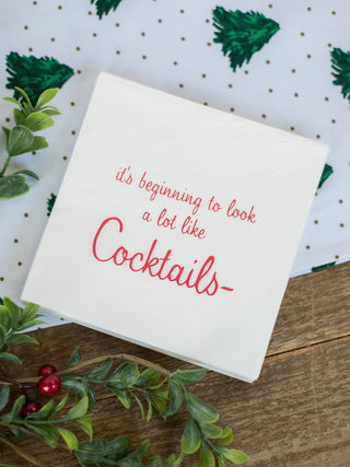 a pack of white and red christmas cocktail napkins perfect for holiday home decor and funny host gifts